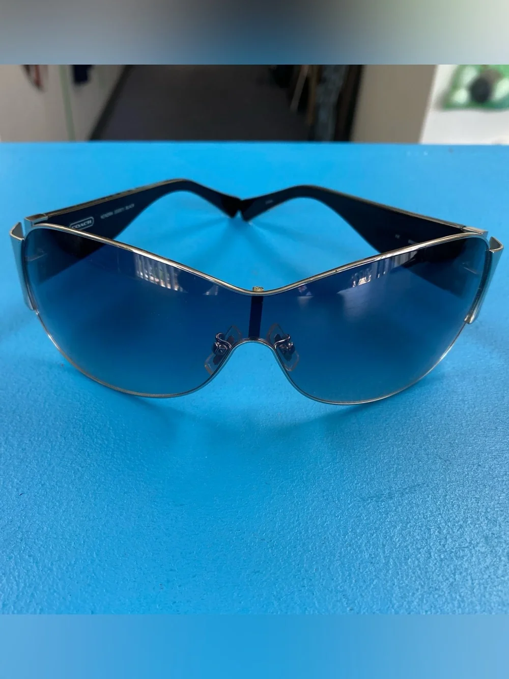 Coach Women’s Blue Gradient Shield Sunglasses with Gold Trim - Picture 1 of 10